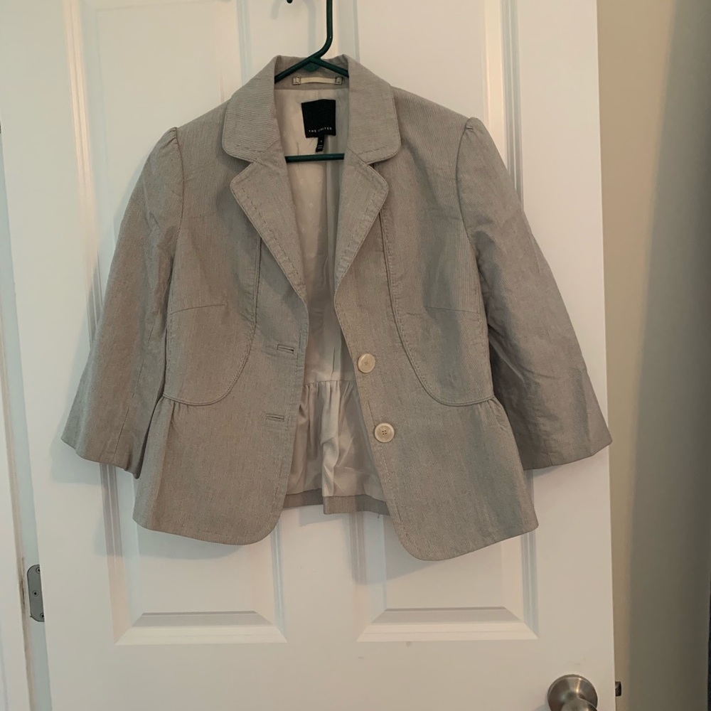 The limited cropped sleeve blazer